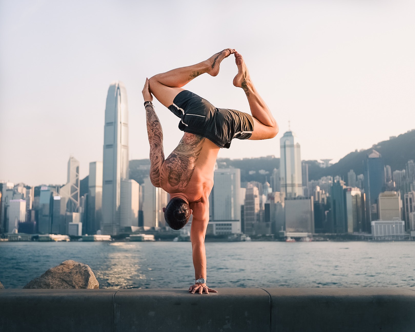 Athlete holding a handstand during the Art of Handstands workshop in Hong Kong