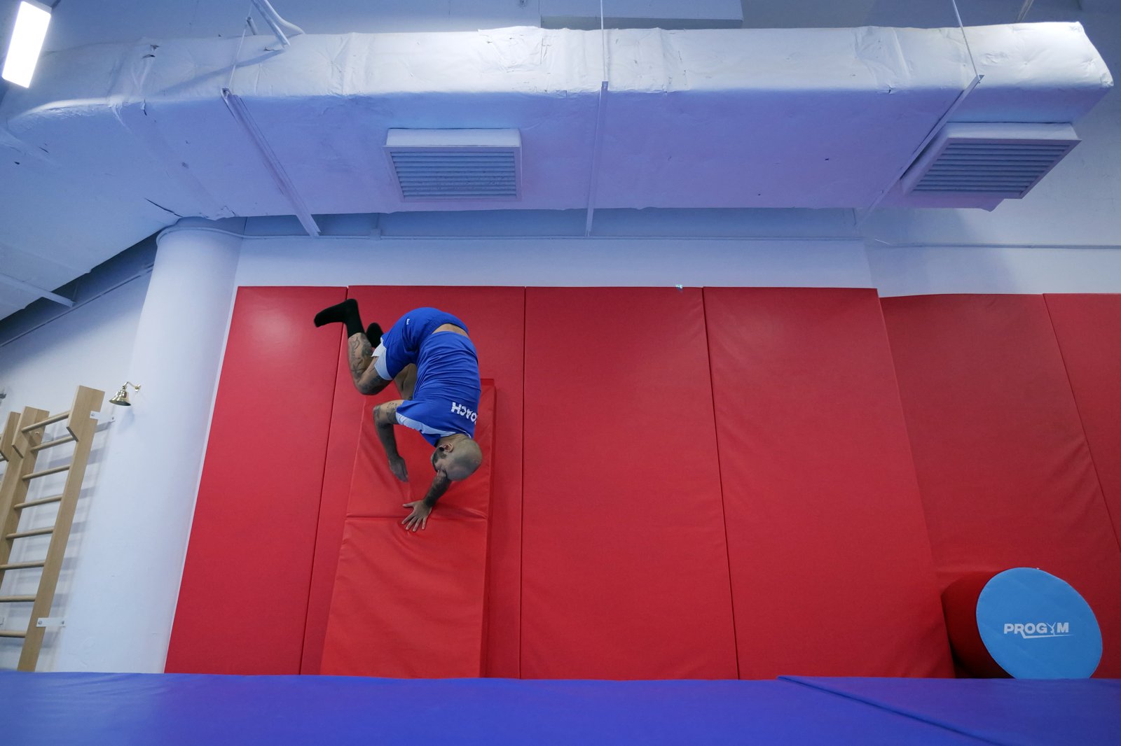 Wall spin during a parkour session at ProGym Cyberport