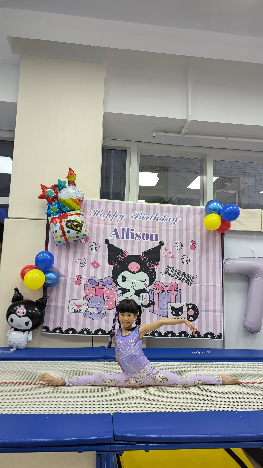 Young gymnast performing the splits at her birthday party at ProGym Hong Kong