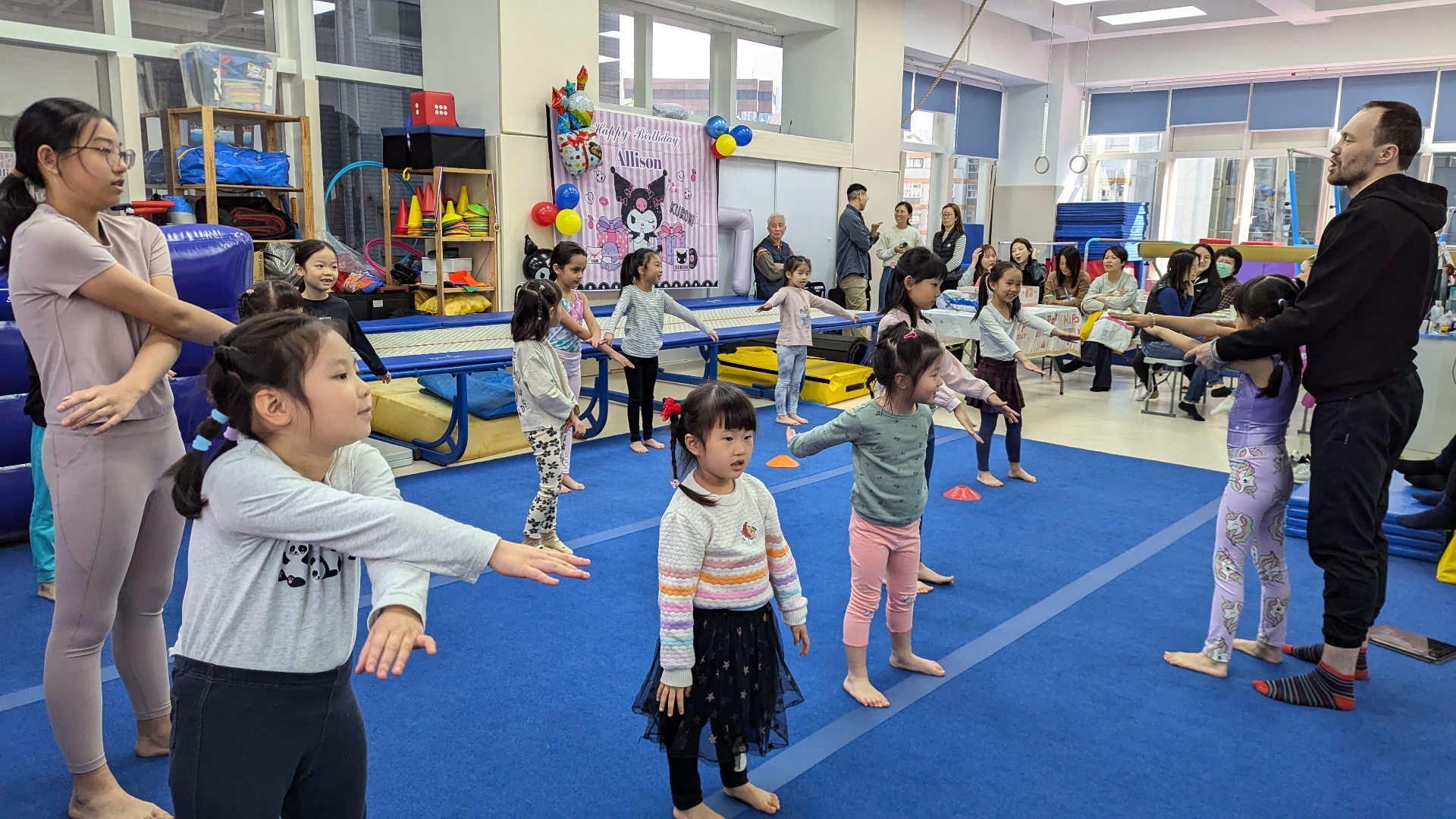 Children warming up together at a ProActiv Hong Kong birthday party