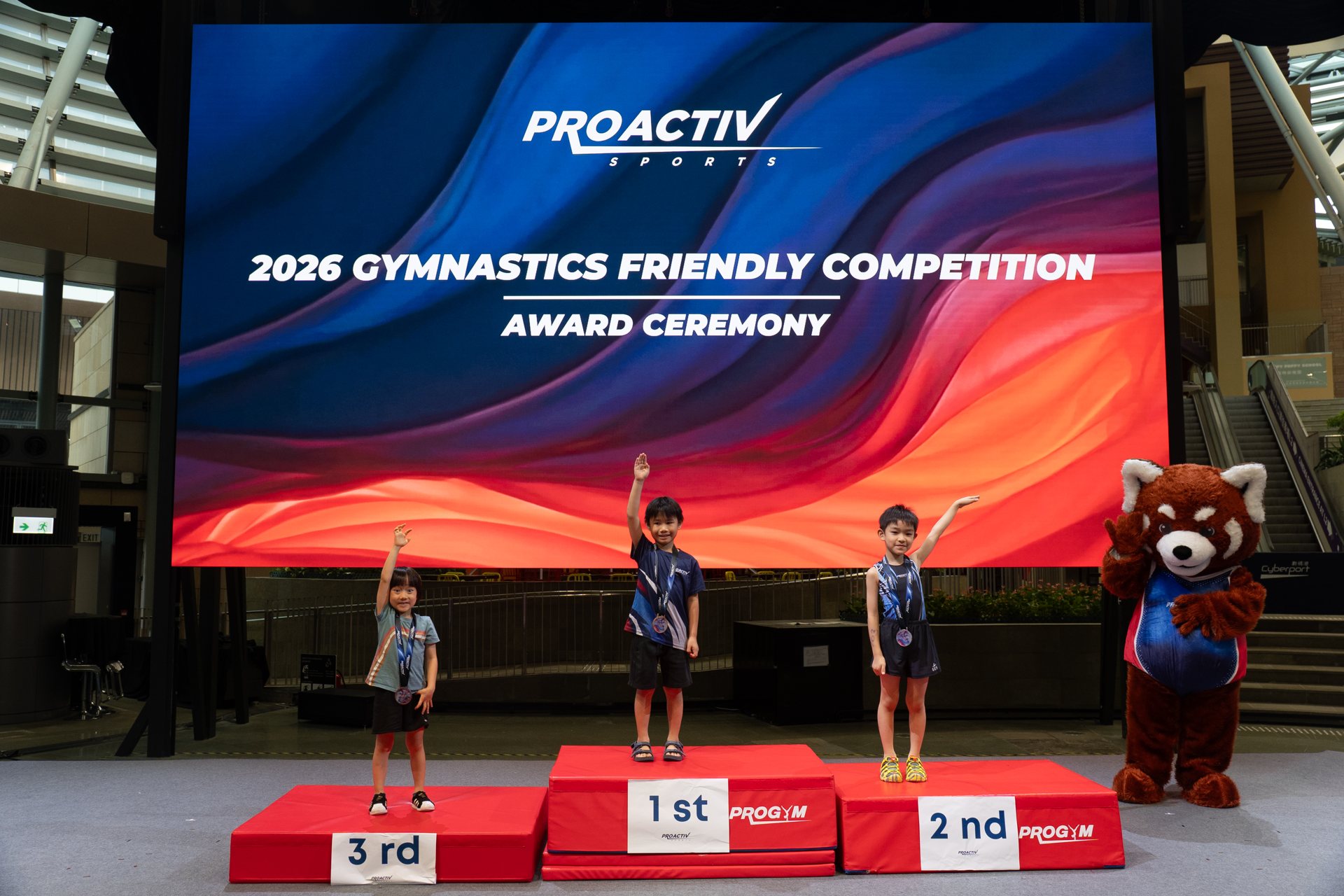 Medal winners on the podium at the 2026 Gymnastics Friendly Competition award ceremony