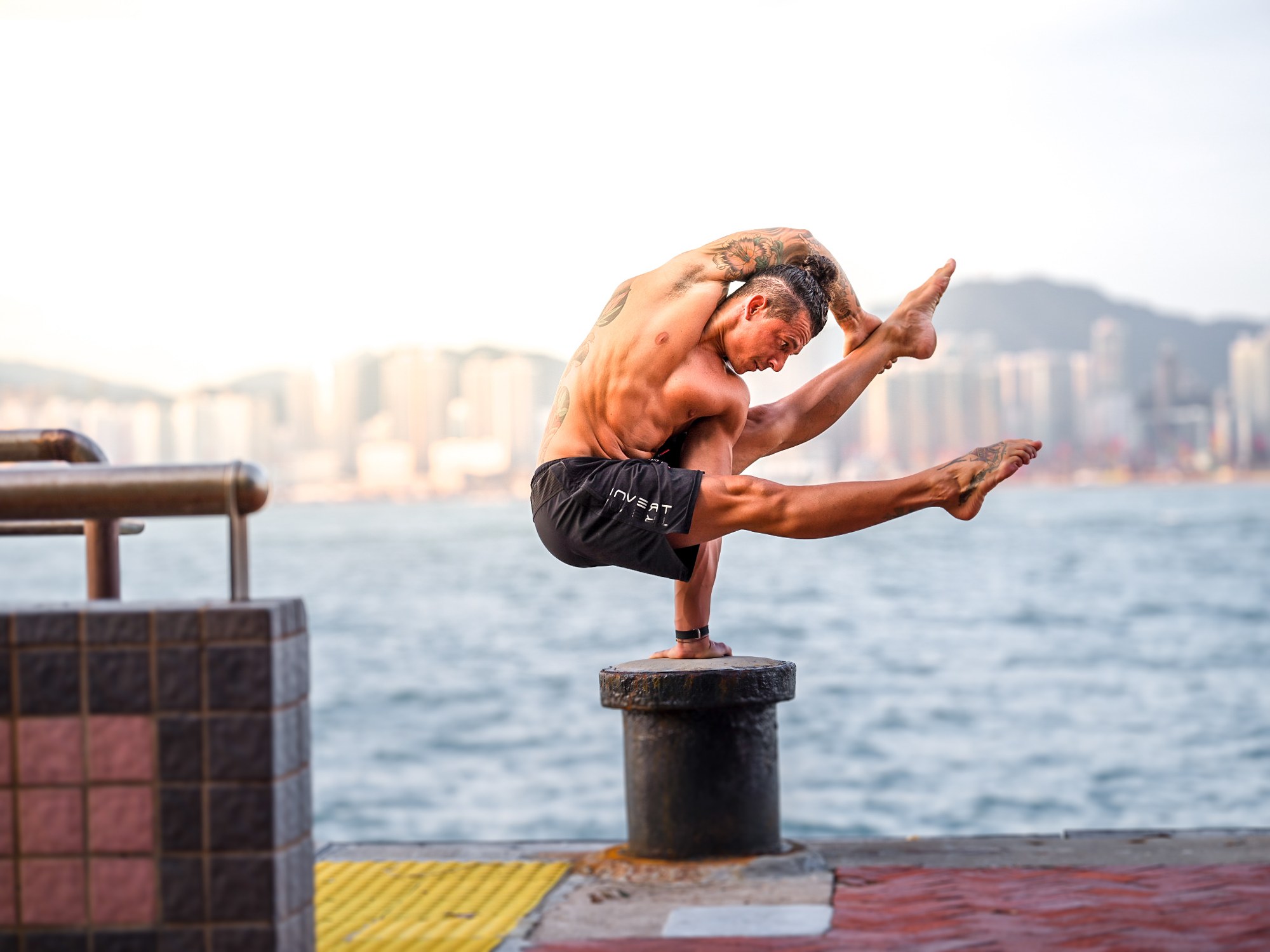 Coach guiding participants through handstand drills at the Art of Handstands workshop