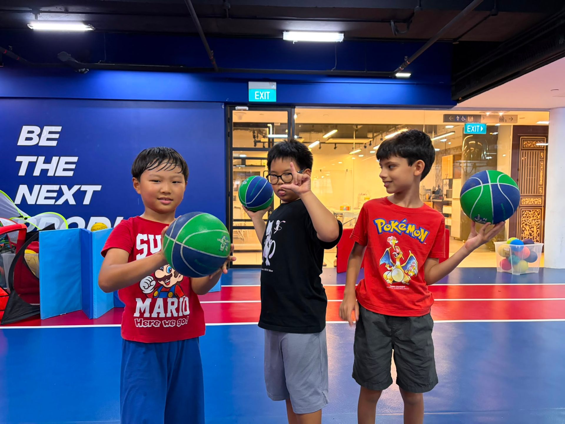 Kids with basketballs at Prodigy Katong Point