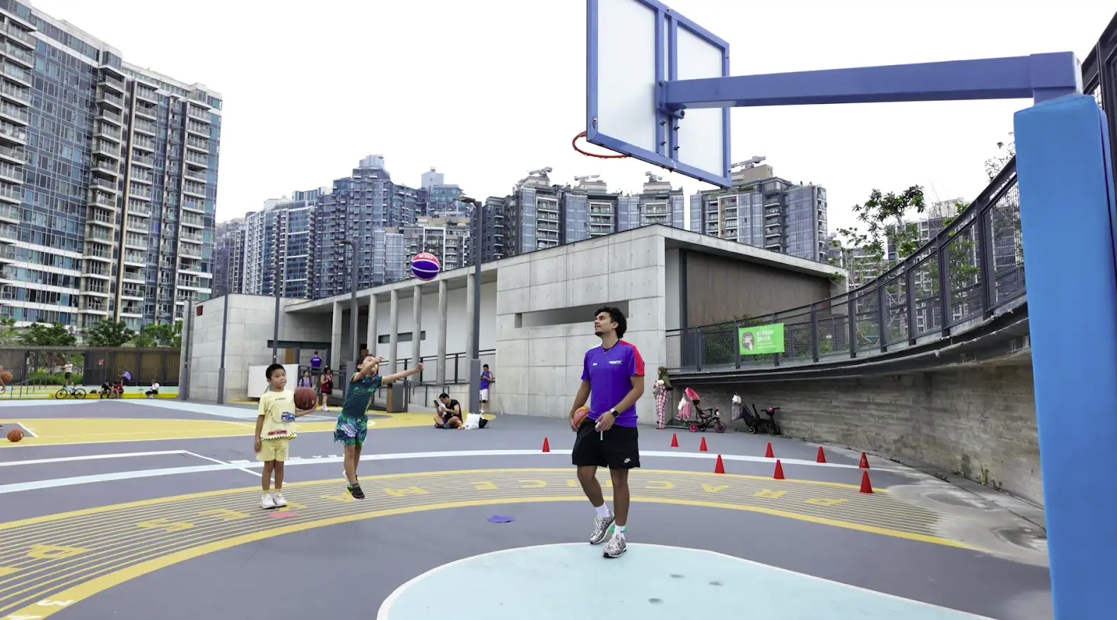 Children playing basketball at a ProActiv Hong Kong Multi-Sport Camp