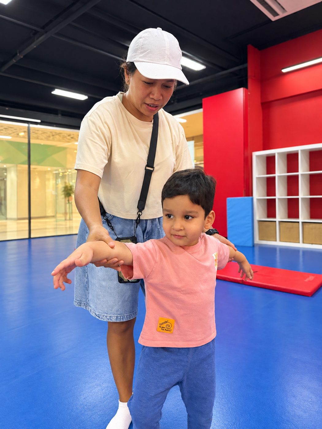 Toddler exploring the soft play course at the Toddler Multi-Sport Program