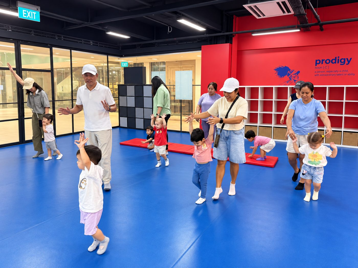 Toddlers and parents enjoying a Prodigy Toddler Multi-Sport session