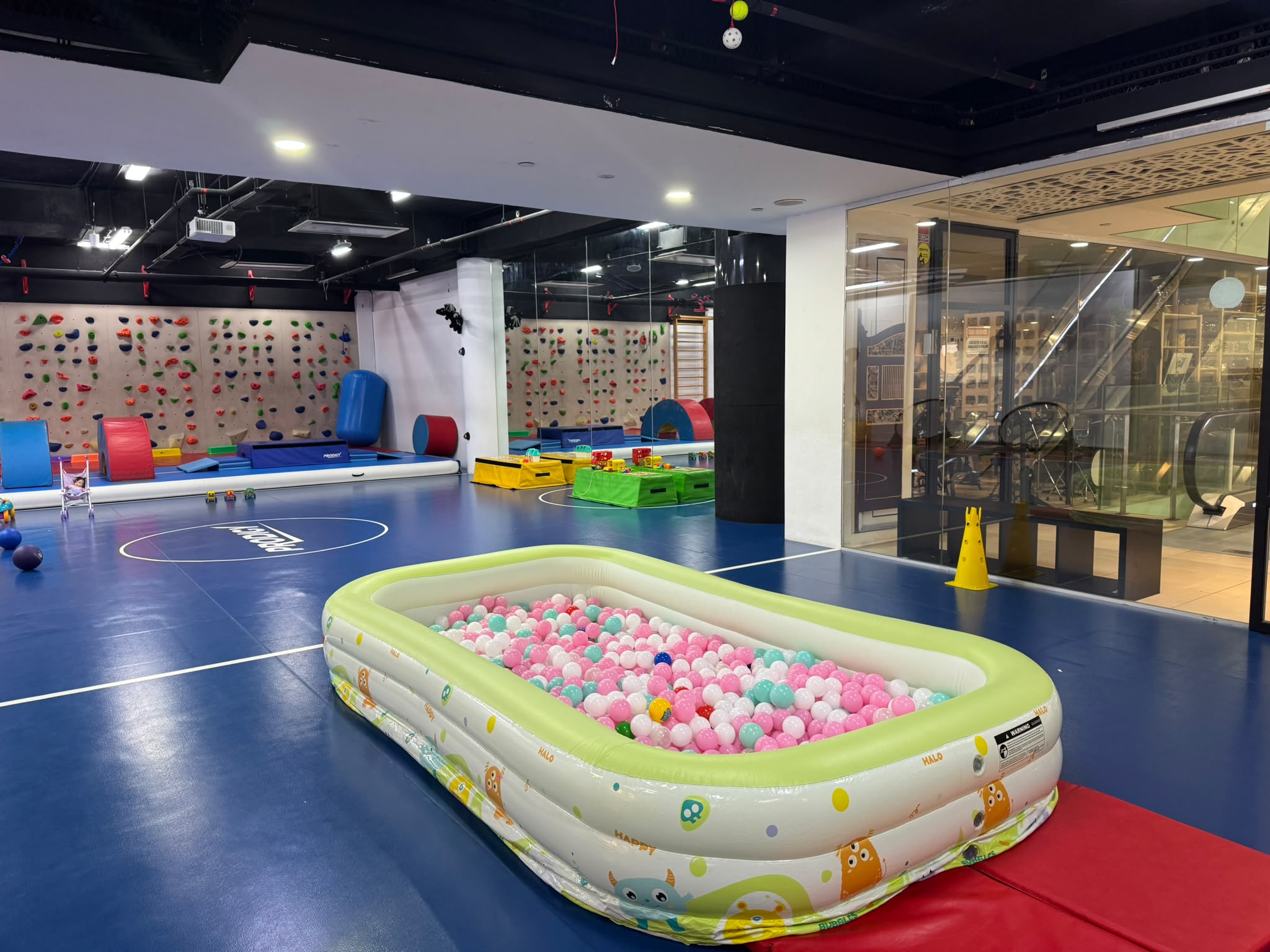 Toddler exploring the play space at Prodigy Toddler Open Gym in Singapore