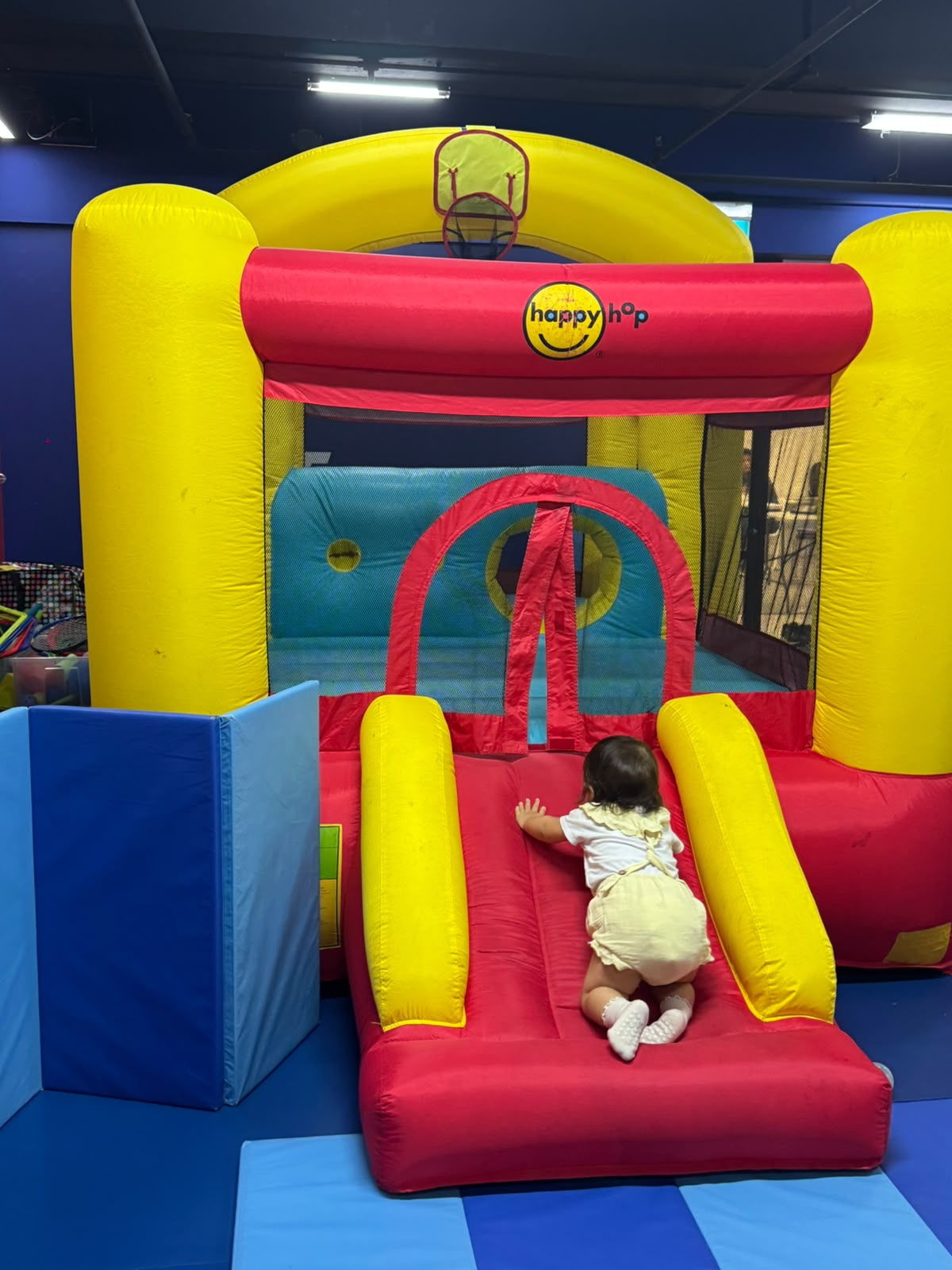 Toddler balancing on movement equipment at Prodigy Toddler Open Gym